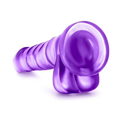 Purple realistic dong with suction cup base and textured shaft for versatile hands-free use.