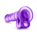 Purple realistic dong with suction cup base and textured shaft for versatile hands-free use.