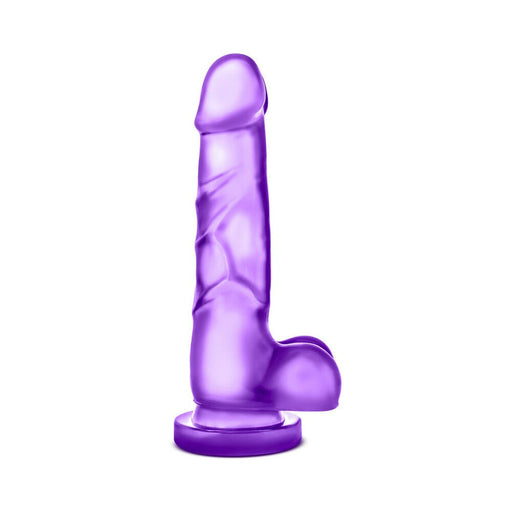 Purple realistic silicone dong with suction cup base and detailed texture, designed for versatile solo or partner play.