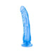 Blue translucent realistic dildo with suction cup base standing upright on white background