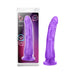 Purple realistic dildo with suction cup base shown in and out of clear retail packaging.