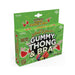 Green packaging of Sweet & Sour Gummy Thong and Bra edible candy lingerie with fruit illustrations and product details.