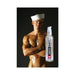 Bottle of Swiss Navy Silicone Lube with a shirtless man wearing a sailor hat in the background on black backdrop.