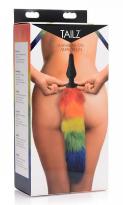 Packaging of Tailz Rainbow Tail Silicone Butt Plug showing a colorful faux fur tail attached to a black silicone plug.