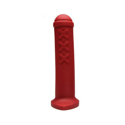 Red silicone mini toy inspired by Amsterdam traffic barriers with three raised X marks and a rounded top.