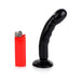 Black compact curved silicone dildo with suction base next to a red lighter for size comparison.