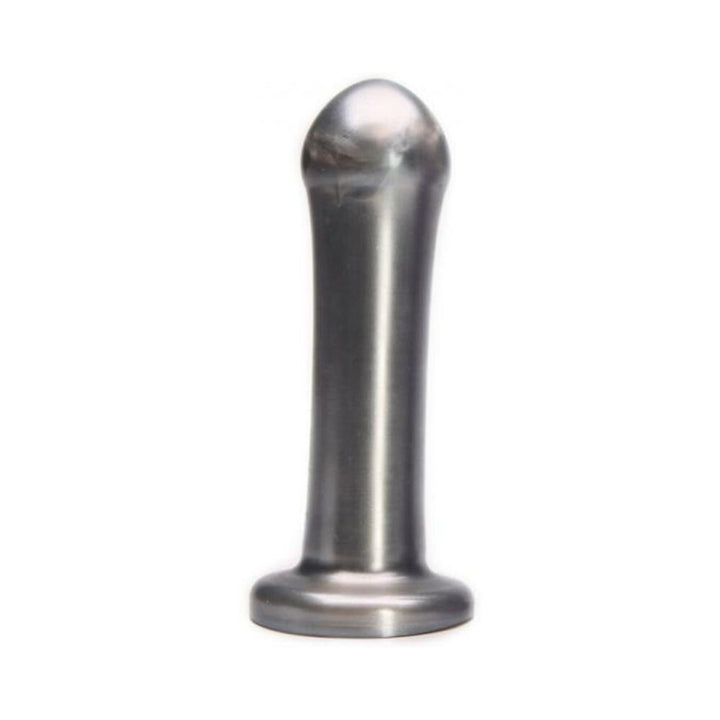 Silver Tantus Dill Drive dildo with smooth shaft and pronounced head, standing upright on a flat base.