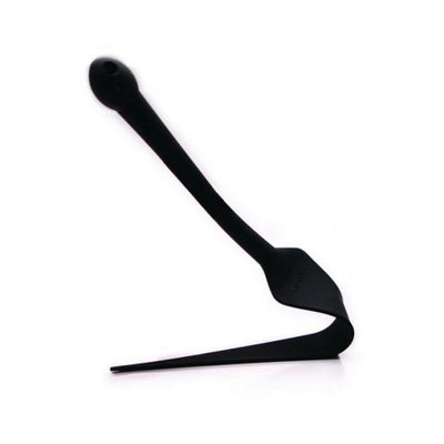 Black silicone Tantus Dragon Tail paddle with a narrow tip and ergonomic handle for versatile impact play.