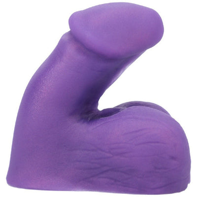 Purple silicone packer with realistic texture and curved shape designed for comfortable everyday wear.