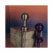 Silver and purple metallic orb-shaped adult toys displayed on a reflective surface with a gradient background.