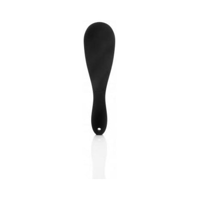Black silicone paddle with smooth rounded edges and a small hole at the handle end for hanging.