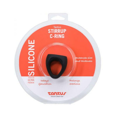 Tantus Stirrup C-ring in black silicone displayed in round orange and white packaging.
