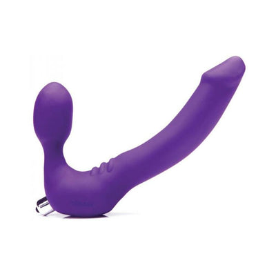 Purple strapless silicone dildo with curved shaft and bulbous base, featuring a removable silver bullet vibrator.
