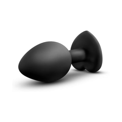 Small black tapered silicone anal plug with a heart-shaped base and a sparkling gem accent.