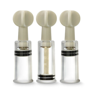 Set of three clear Temptasia clit and nipple twist suckers with beige twist handles and adjustable suction cylinders.