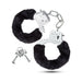 Pair of metal handcuffs covered in soft black faux fur with two matching keys on a white background.