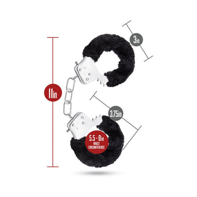 Black faux fur-lined metal cuffs with chain, showing dimensions and adjustable wrist circumference for secure, comfortable fit.