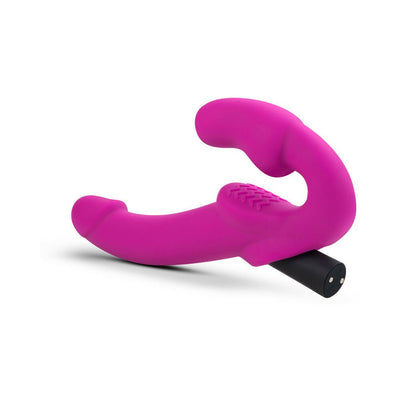 Pink strapless silicone dildo with ergonomic design and textured clitoral stimulator, featuring a removable black vibrating bullet.