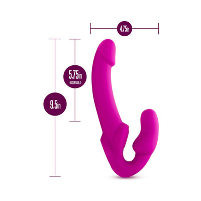 Pink strapless silicone dildo with curved design and dimensions labeled for insertable length and width.