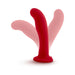 Red silicone curved probe with suction cup base shown in multiple angled positions on white background.