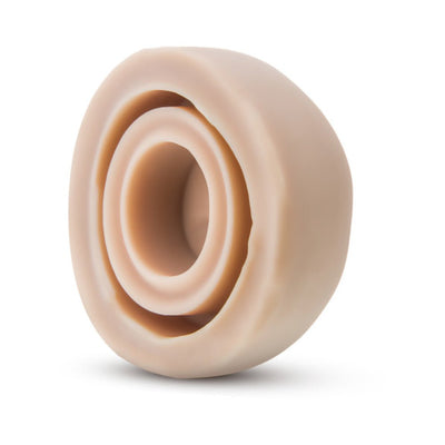 Set of two beige silicone nipple pump seals designed for comfortable suction and easy cleaning.