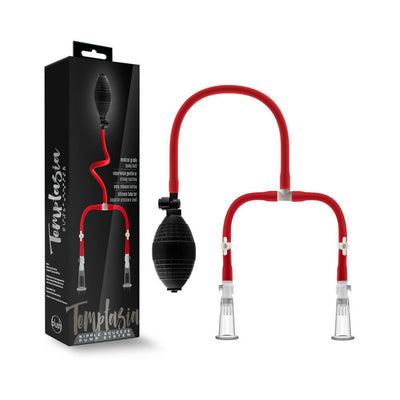 Temptasia nipple squeeze pump system with black pump bulb, red tubing, and clear acrylic cylinders next to its black packaging box.