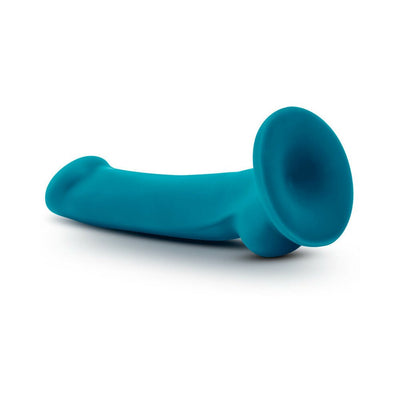 Teal silicone G-spot and prostate stimulator with suction cup base, curved design for targeted pleasure.