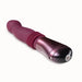 Temptasia Trixie thrusting dildo in wine color with curved silicone shaft and metallic handle with power button.
