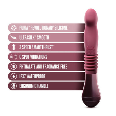 Temptasia Trixie thrusting dildo in wine color with ergonomic handle and key features listed on the side.