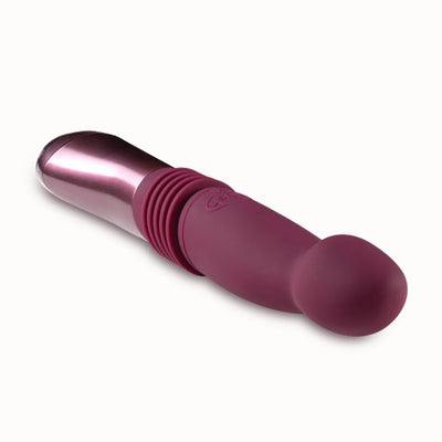 Temptasia Trixie thrusting dildo in wine color with curved shaft and metallic handle on white background