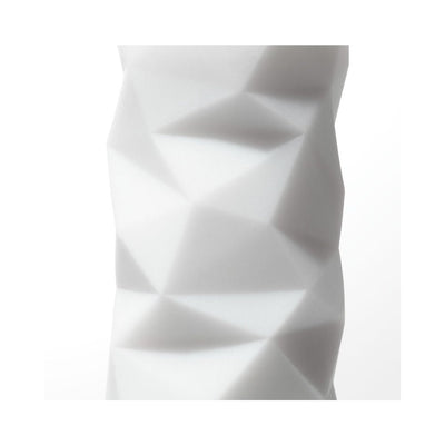 Close-up of Tenga 3D Polygon textured surface with geometric polygonal pattern in white material.