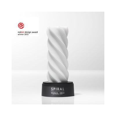 White spiral-textured reusable stroker displayed on a black base with Red Dot Design Award 2012 logo.