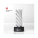 White spiral-textured reusable stroker displayed on a black base with Red Dot Design Award 2012 logo.