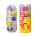 Clear Tenga Bobble Magic Marbles sleeve with purple and yellow textured inserts beside its yellow and pink branded storage case.