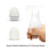 Tenga EGG Boxy stretchable white silicone sleeve shown in packaging and being stretched by hand to demonstrate flexibility.