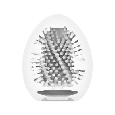 Cross-section view of the Tenga EGG Combo showing its textured interior with spiral ribs and varied protrusions.