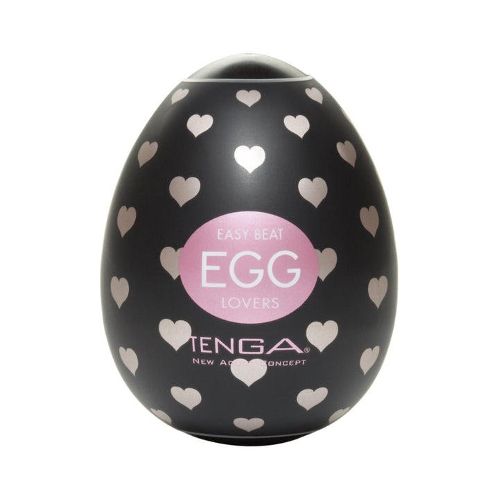 Black Tenga EGG Lovers disposable male toy with pink hearts and a pink label on the front.