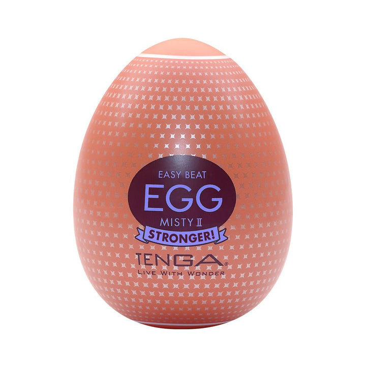 Tenga EGG Misty II in peach with silver pattern and bold label, compact and egg-shaped adult product packaging.