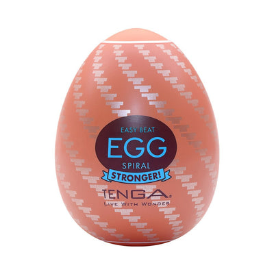 Tenga EGG Spiral in orange with silver spiral pattern and blue label on a white background.