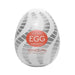 Compact Tenga EGG Tornado pleasure device with white and silver swirl design and red label on front.