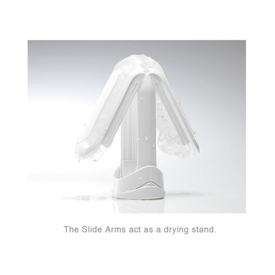 Tenga FLIP ZERO White opened and positioned on drying stand with water droplets on the surface.