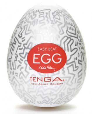 Tenga Keith Haring Egg Party Stroker with signature black and white Keith Haring artwork and red Easy Beat label on white egg-shaped casing.