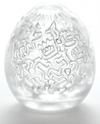Clear Tenga Keith Haring Egg Party Stroker with textured interior and iconic Keith Haring artwork design.