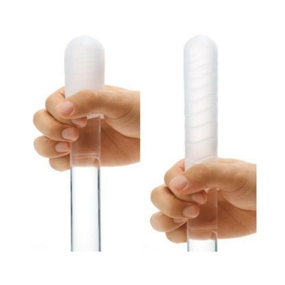 Hand holding a translucent Tenga Pocket Masturbator Sleeve Spark Beads, demonstrating its stretchable texture.