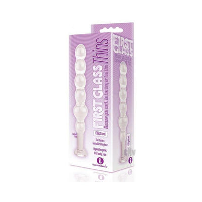 Packaging of the First Glass Thins Elliptical glass plug with a clear, smooth, beaded design on a purple background.
