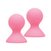 Pair of pink silicone nipple suckers with smooth, rounded design for enhanced sensitivity and stimulation.