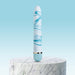 Blue and white marbled vibrator with gold accent standing on a round marble pedestal against a light blue background.