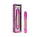 Pink slimline vibrator with glitter design next to matching decorative box labeled limited edition.