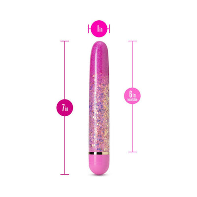 Pink slimline vibrator with glitter design, measuring 7 inches long and 1 inch wide, featuring a smooth rounded tip.