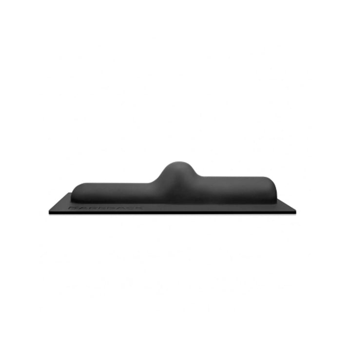 Black silicone attachment with a gentle central bump on a flat base for enhanced pleasure.